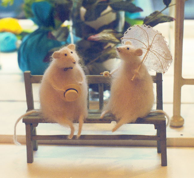 two mice on a bench